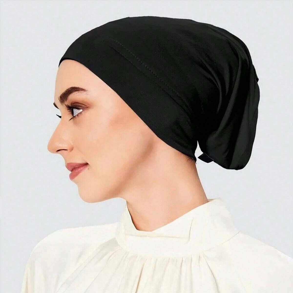 Essentials Inner Cap in Black, offering comfort and secure fit for hijab styling and modest wear.