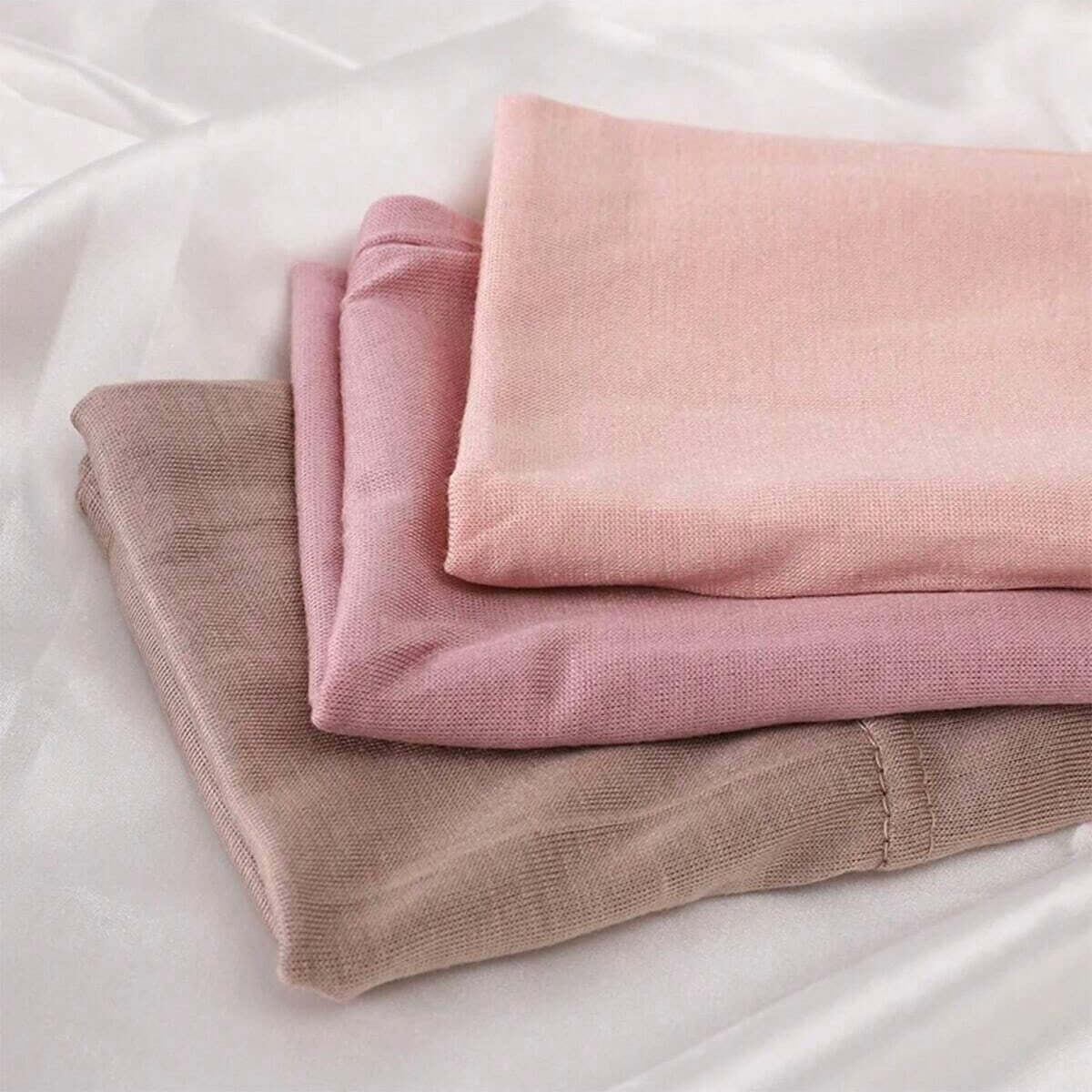 Three soft chiffon scarves in pink and beige hues, perfect for modest wear and styling with hijabs
