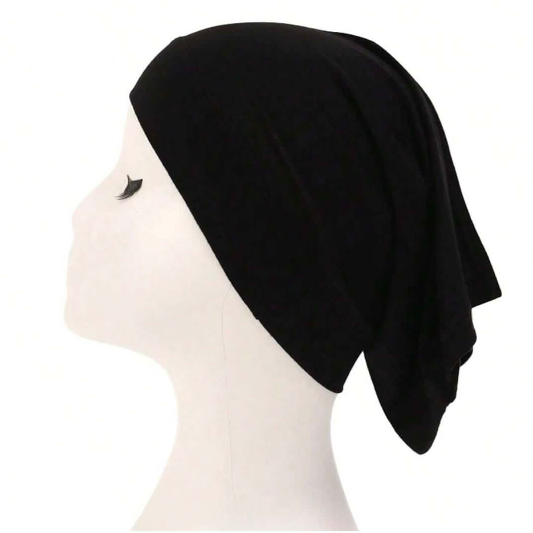 Essentials Inner Cap in Black, offering comfort and secure fit for hijab styling and modest wear.