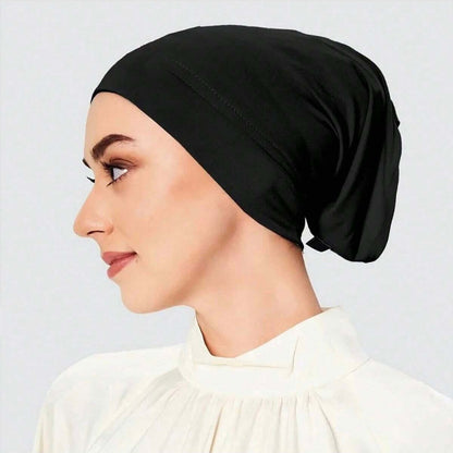 Essentials Inner Cap in Black, offering comfort and secure fit for hijab styling and modest wear.